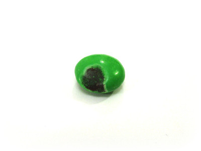 A small green one, with a big chunk chipped off, front and center.