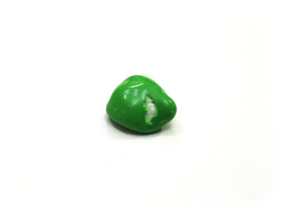 A crumpled plain green one, with crystallized white crusty bits in a divot.