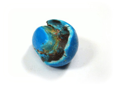 A blue nutted one, with abbout half of the chocolate gone, but a candy coat on the peanut nub. It rotates back and forth.