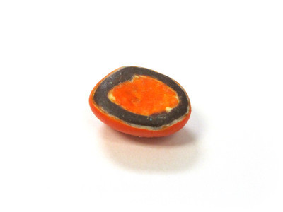 Zen looking orange, with a ring of chocolate surrounding an island of shell.